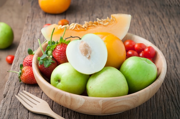 wood table with variety fruits