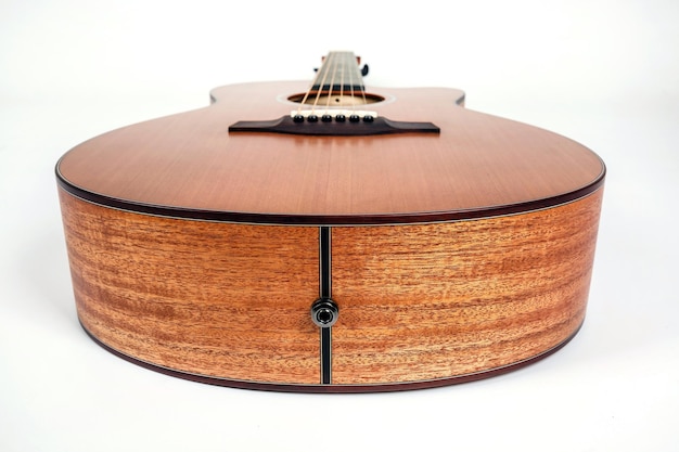 Wood texture of lower deck of six strings acoustic guitar on white background guitar shape