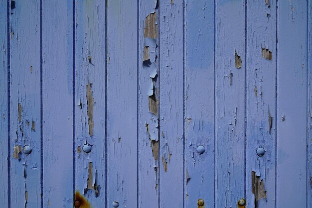 Wood texture painted blue big weathered wooden background from plank