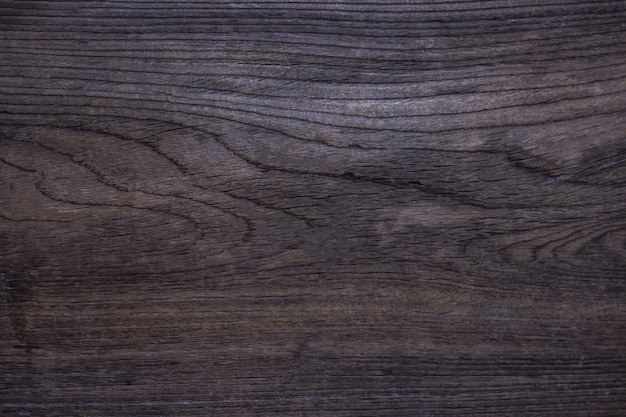 Wood texture. Surface of dark wood background 