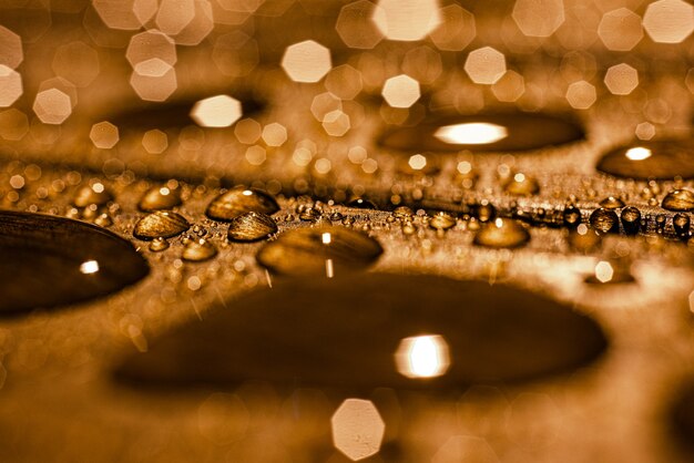 Wood texture with raindrops with selective focus Copy space