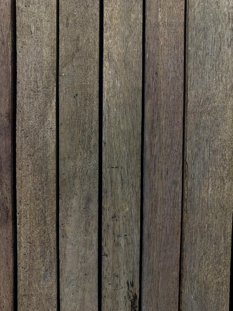 Wood texture with some imperfections and grooves Rustic wooden boards Some leaves on top Top view