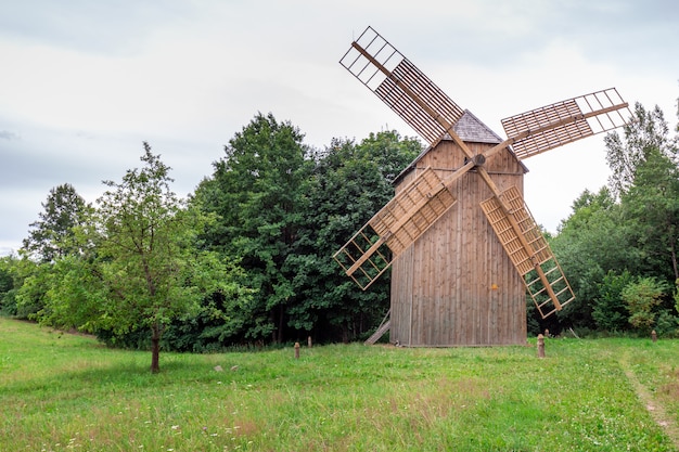 Wood windmill in the nature