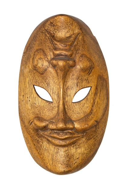 白い背景に分離された木製のアフリカのマスク。旅行のお土産。