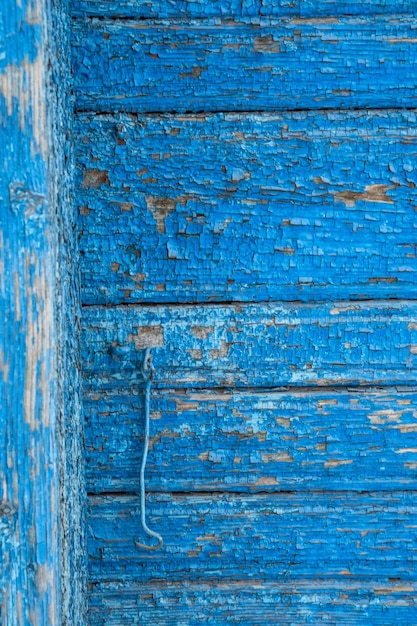 Wooden antique background blue color Wooden texture background Facade of a wooden house