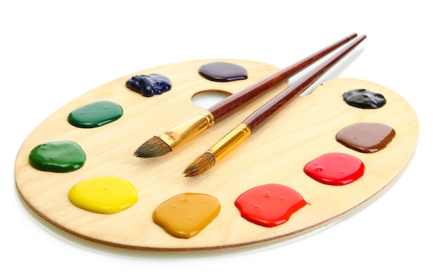 Acrylic paint and brushes on wooden palette - Stock Image - Everypixel