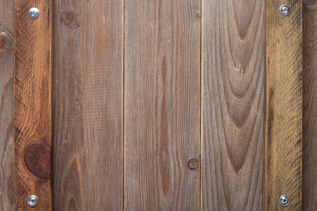 Wooden background as texture surface with screws, top view