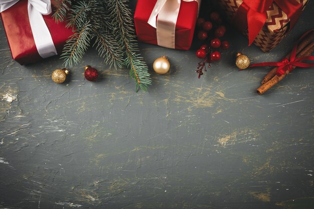 Wooden background copy space with christmas gifts and decorations for your design