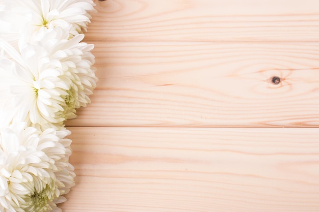 Wooden background with flowers Copy Space