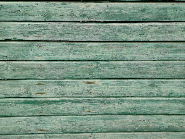 Wooden background with old paint