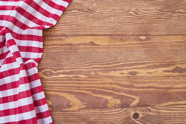 Wooden Background with Plaid Fabric