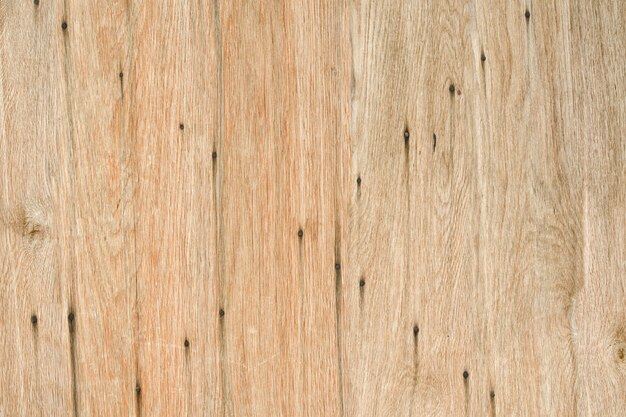 Wooden background with rusted nails