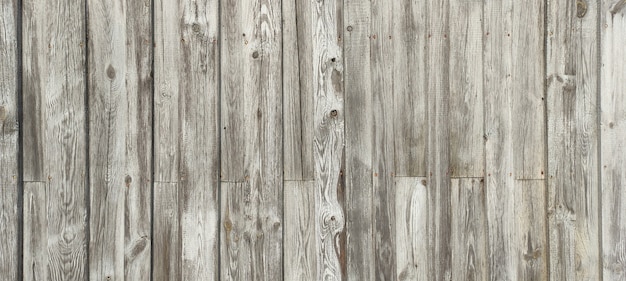 Wooden background with weathered wood and rusty nails