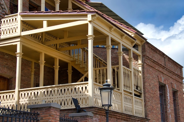 Wooden balcony in an old house in Georgia, Tbilisi. 