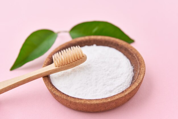 Wooden bamboo toothbrush and baking soda