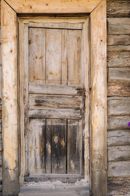 Wooden barn door with handle old wooden buildin