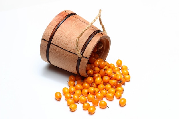 A wooden barrel of buckwheat berries close-up