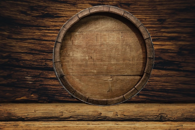 Wooden barrel and worn old table of wood