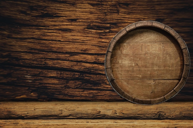 Wooden barrel and worn old table of wood