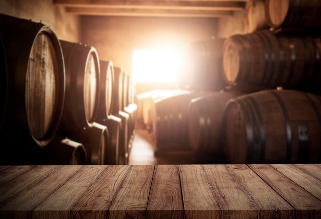 Wooden barrels in a cellar with the word wine on the top