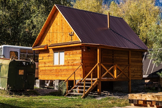 Wooden bathhouse at camp site. Russia, Altai, Lake Teletskoye, Cape Kirsay