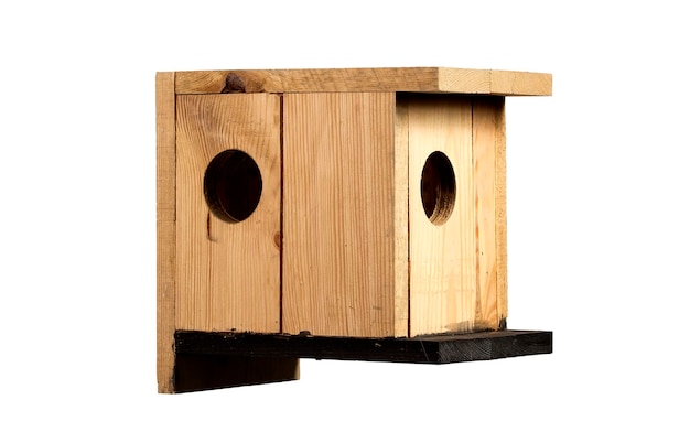 Wooden birdhouse on a white background