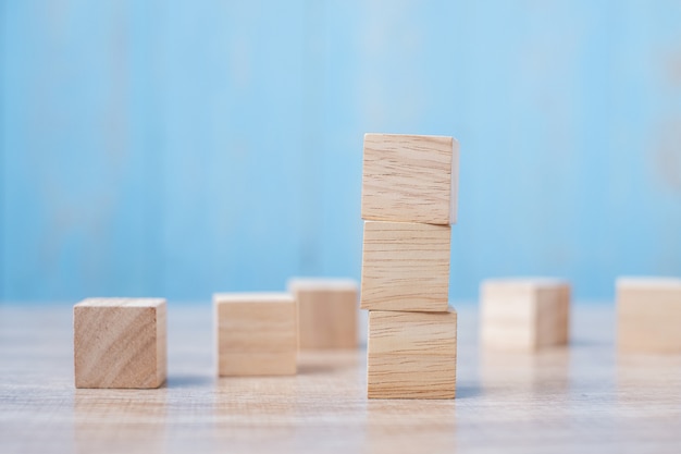 Wooden block on the building. Business planning, Risk Management