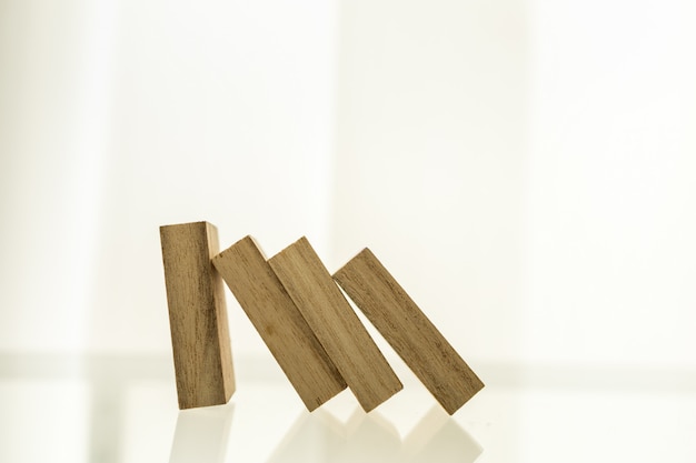 wooden block standing and the collapse of fall in line