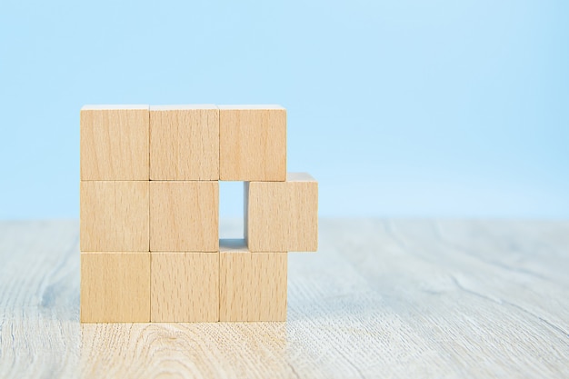 Wooden block toy stacked in square shape