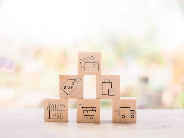 Wooden block with online shopping and ecommerce icons set