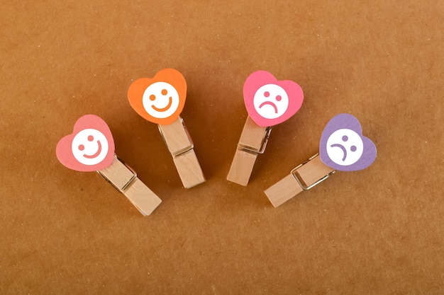 Photo the wooden blocks showcasing emotion face symbols represent the concept of evaluating and improving service rating ranking customer review satisfaction evaluation and feedback