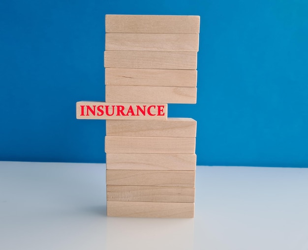 Wooden blocks with text insurance safety protection and guarantee