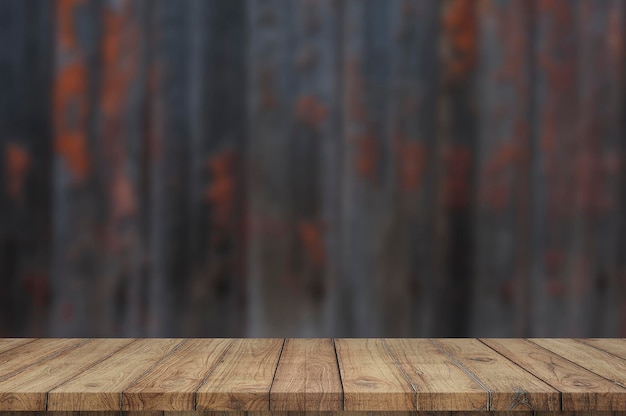 Wooden board empty table in front of blurred background, can be used for display your products.