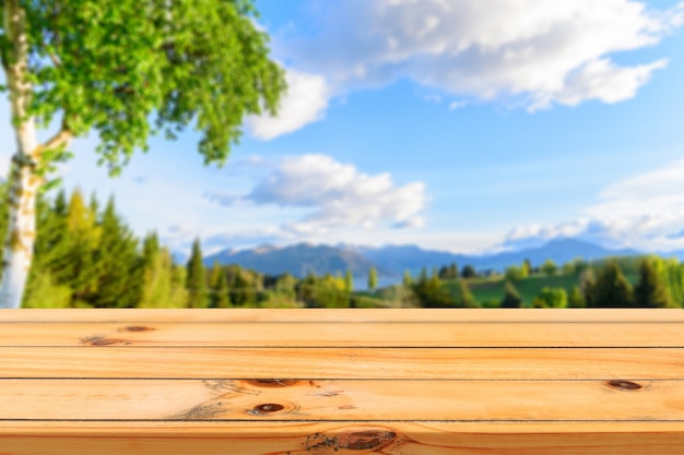 Wooden board empty table in front of blurred background