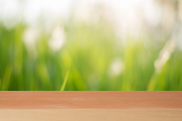 Wooden board empty table in front of blurred background