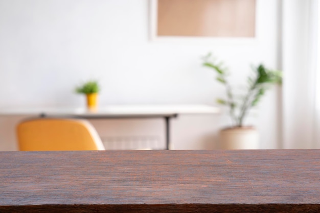 Wooden board empty Table Top And Blur Interior over blur in coffee shop Background