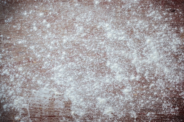 A wooden board sprinkled with flour. 