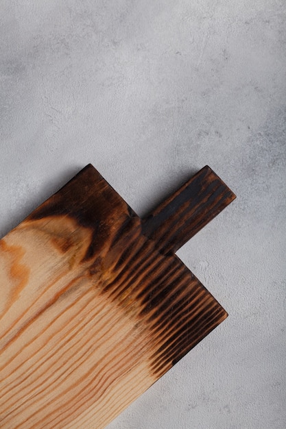 Wooden board on white background