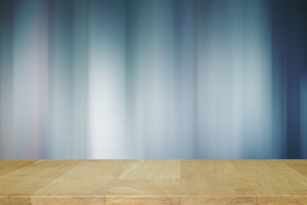 Wooden board with Blurred Lights on blue background or Lights on blue background.