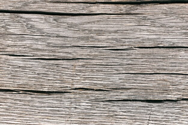 Wooden board with detailed cracked texture, wooden surface for design