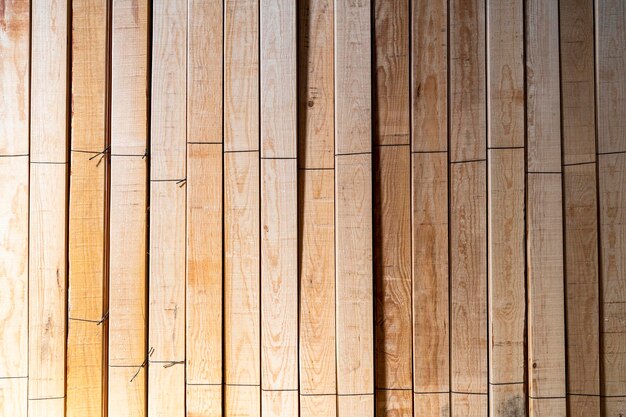 Photo wooden boards stored wood timber construction material for background and texture stack of wooden