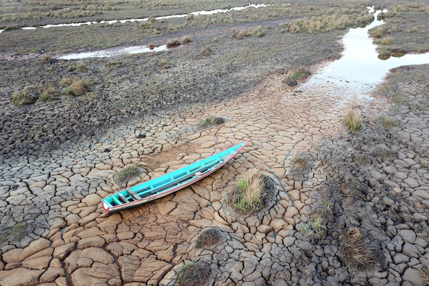 Wooden boat on drought land from drought