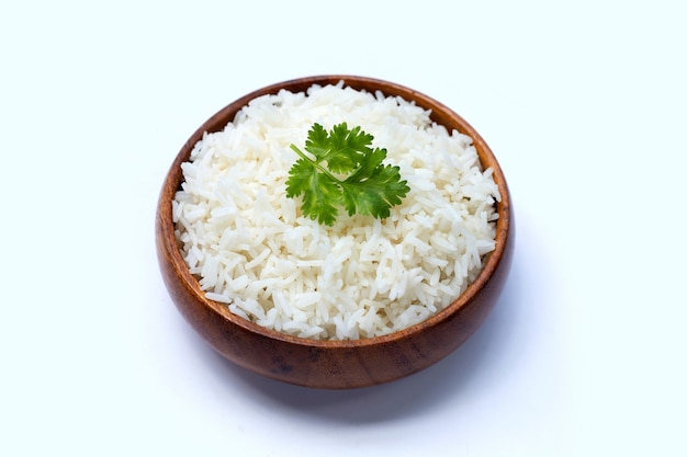 Wooden bowl of rice on white background.