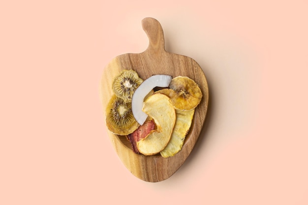Wooden bowl with healthy dried fruits