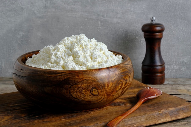 Wooden bowl with homemade cottage cheese