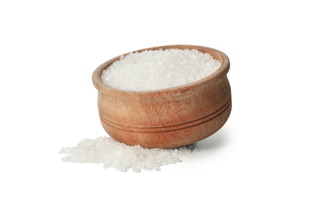 Wooden bowl with salt isolated on white