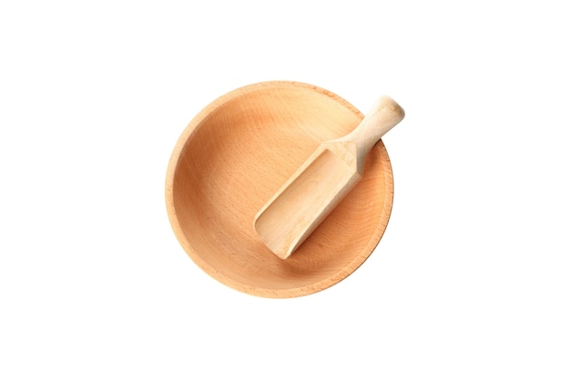Wooden bowl with scoop isolated