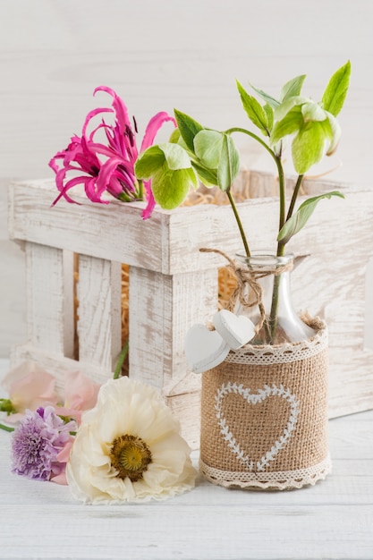 Wooden box with lilly and flowers