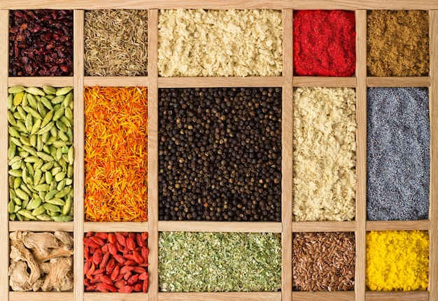 Wooden boxes with Indian spices and herbs