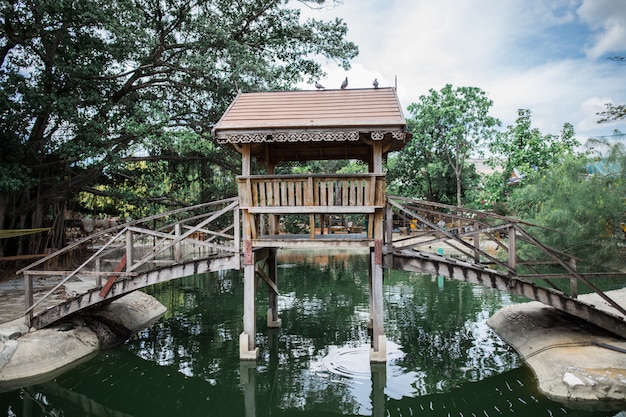 Wooden bridge across the river